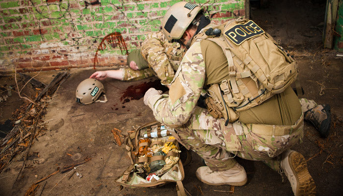 TacMed™ R-AID® Kit open during casualty scenario
